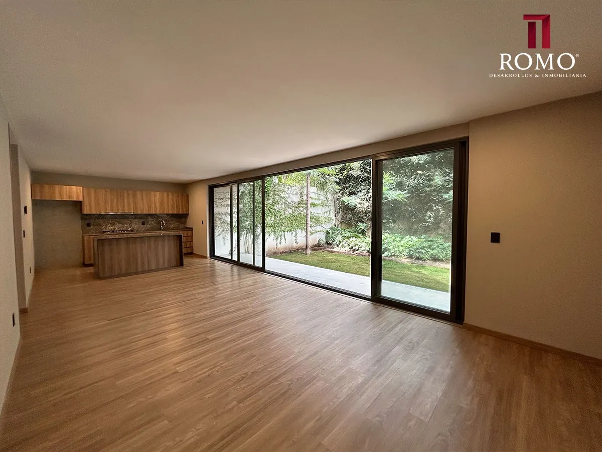Sala con jardín del departamento CEIBA en Bogotá Living Providencia